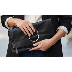 Hobo’s bifold clutch soft-grained leather slim, magnetic snap closure